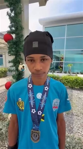 🎙️ Post-Tournament Interview PES client Chadane Wallace aka @zambie.mtn , the winning captain of Pembroke Elite Soccer, sharing his thoughts after returning to Jamaica 🇯🇲 at the Norman Manley International Airport. Leadership. Pride. Excellence 💛🖤 📌 PEMBROKE ELITE SOCCER IS A SPORTS MANAGEMENT ORGANIZATION THAT DEALS WITH THE DEVELOPMENT AND MARKETING OF PLAYERS (AMATEUR, SEMI-PRO, PROFESSIONAL) AROUND THE WORLD 🌎 | PES