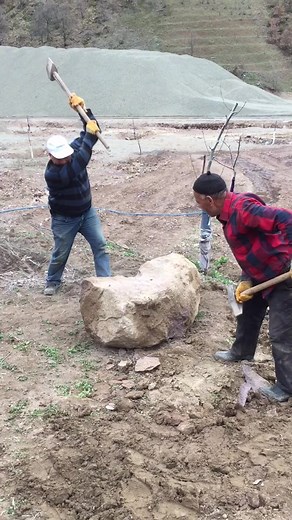 Outdoor Rock Breaking Techniques with Hammer