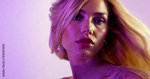 Model with hair flying in the air.