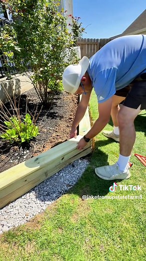 Timber retaining wall build! #landscaping #flowerbed #gardening #retainingwall #diy #design #dreambackyard