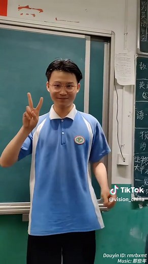 Teacher Styles Boys' Hair for Graduation Photos