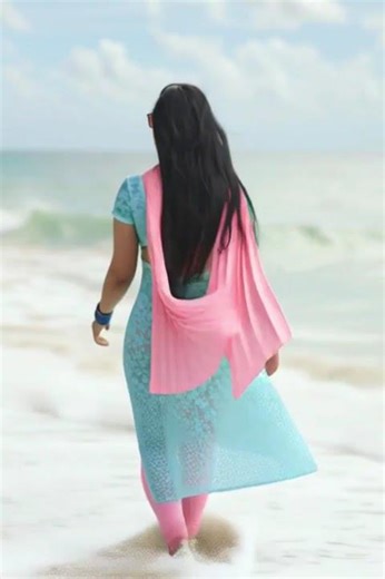 Stylish Beach Day: Lady Enjoying Seaside Breeze in Chic Outfit