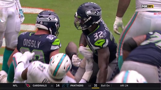 Chris Carson plows through goal-line pile for strong TD