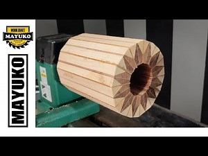 Beautiful vase of camphor wood and maple, woodturning