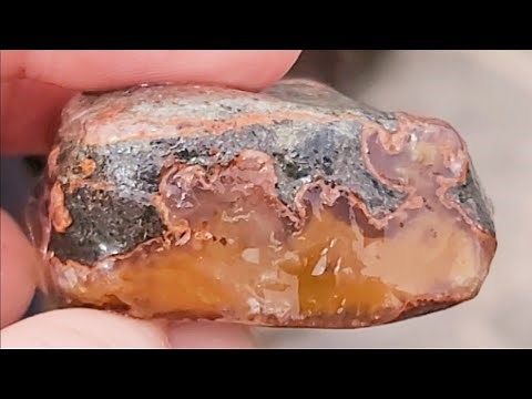 Ordinary Orange Rock Found On The Beach Turns Into Three Beautiful GEMSTONES