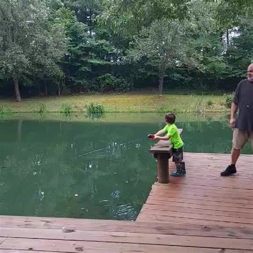 Forgot to post this hilarious video of my son setting the rod down and a fish taking off with it lol #fishing #fishinglife #fishingtiktoks #dad #blooper
