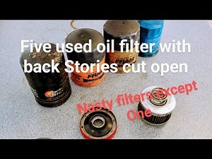 Five used oil filters cut open