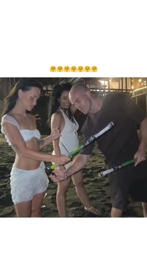 universe___education on Instagram: "- The post shares a 35-second video of revellers on a beach at night mishandling sparklers by holding them upside down, causing flames to burn towards their hands and sparking chaotic panic, captured with shouts of "the other way". - Uploaded on 3 January 2026 by @MRinderman56204, it rapidly amassed over 10 million views and 12,000 likes, eliciting replies that blend amusement with mockery over the group's apparent incompetence. - Such incidents underscore fir