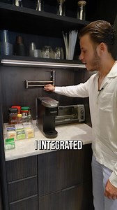 We went all the way with this coffee station design, sleek and functional - a dedicated pot filler for the ultimate convenience | Thekitchenguy