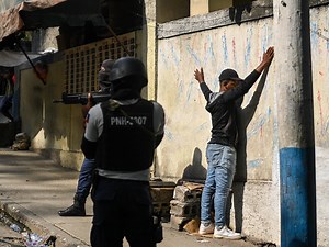Suspected Haiti gang members stoned, set on fire by crowd