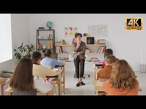 Educational Excellence: Inspiring Lecture by Female Teacher in Classroom | 4K Free Stock Video