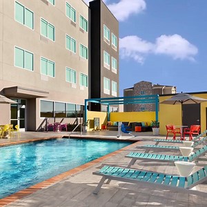 1.3K views · 20 reactions | What's your favorite poolside accessory? Give us a  for floaties or a ❤️ for frozen drinks. | Tru by Hilton | Facebook