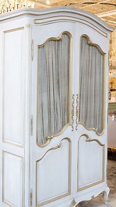 An antique French armoire, restored and custom finished for modern living— the Le Chateau way. | Le Chateau European Interiors