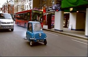 Driving the smallest car in the world.