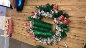 403 reactions · 71 shares | A lil ROCKIN & wreathin Christmas at the craft table tonight! Thanks to Decorator Crafts for some awesome supplies! ❣️ This is a double base design~ it is when you use a wreath on top of another wreath and add your ribbon, mesh & sprays to create your own unique look! I just love the red white wreath base & ribbons, topped off with a poinsettia & flocked pines.... this is a wreath to Fa La La about! ❤️ I hope you ENJOY! | Ba Bam Wreaths | Facebook