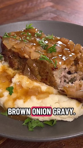 Meatloaf night never disappoints. This one bakes up tender and juicy, and that onion gravy takes it to another level. Serve it with creamy mashed potatoes and you’ve got the perfect cozy dinner. #meatloaf #comfortfood #mashedpotatoes #dinnertime #easyrecipes