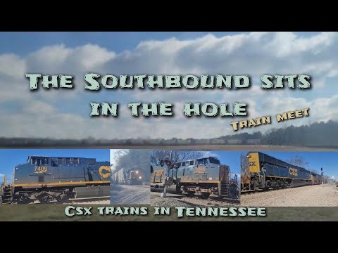 CSX Southbound sits in the hole. Train meet. 3 trains.