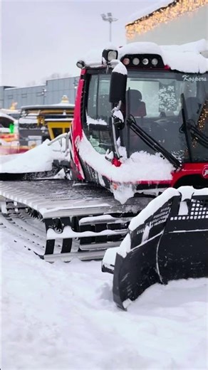 Powerful Snow Groomer in Action - Clearing Deep Snow with Precision
