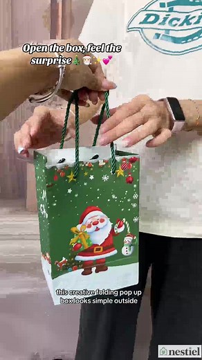 Experience the perfect holiday surprise with the Christmas Folding Surprise Gift Box Money Pop Up! Watch as this festive gift box transforms in seconds—unfolding to reveal hidden cash, photos, or heartfelt messages. Fun, creative, and full of Christmas magic, it’s the ideal way to make your gift truly unforgettable. Perfect for friends, family, and anyone you want to surprise this holiday season! | Nestiel Store | Facebook