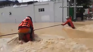 Emergency responders work to rescue people impacted by typhoon Vamco in Philippines