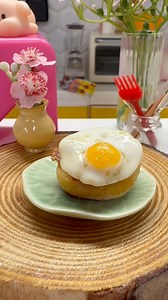 Miniature Bacon & Egg sandwich! Cooking this for the first time in the new mini kitchen and two pans! Do you call em sandwiches or butties? #bacon #eggs #miniatures #minicooking #littlethings | My Mini Bakes