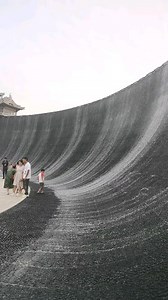 225K views · 98 reactions | A stunning display of modern design, this water art wall features water cascading gracefully down a curved surface, creating a mesmerizing flow. By the time the water reaches the flat surface below, it is completely absorbed, showcasing both beauty and smart technology. The seamless interaction of water and structure makes it a captivating and soothing addition to any space! | Asian Technology | Facebook