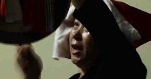 Hmong Funeral Home: A change of spiritual address