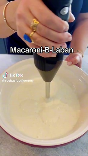 Try it, then judge – it’s so good! Ingredients: * 500 grams spaghetti * 500 grams beef mince * 2 tablespoons olive oil (for frying the beef) * 2 cloves garlic, crushed * 1 kilogram natural yogurt * Salt, to taste * 3 tablespoons olive oil (for frying pine nuts) * 1/4 cup pine nuts * 2 tablespoons fresh parsley, chopped (for garnish) Method: Step 1: Boil the spaghetti in salted water according to the packet instructions, then drain. Meanwhile, fry the beef mince in 2 tablespoons of olive oil unti