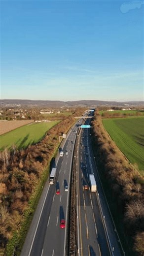 clip-3997963505-drone-top-view-multilane-highway-moving-cars