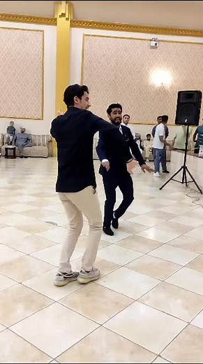 Formal Dance Routine: Man and Boy in Suits