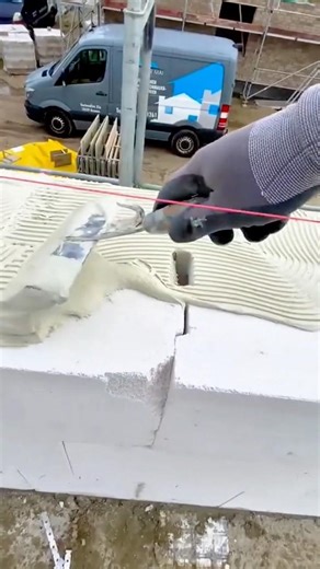 Applying Mortar Evenly on Concrete Blocks Using a String Line for Precise Alignment #shorts