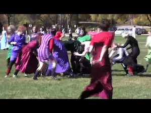 Raw video - Girls playing rugby in prom dresses
