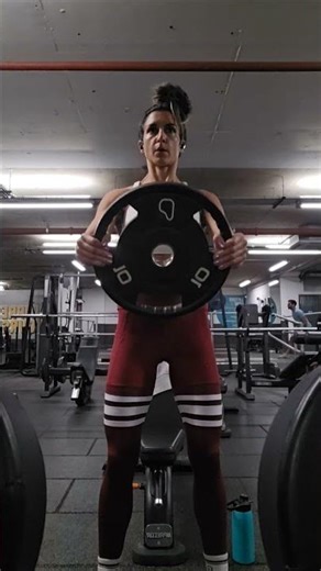 Standing Plate Front Raise