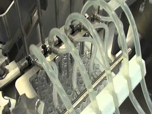 Nested Syringe filling and Stoppering Machine