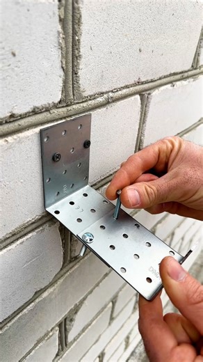 DIY Bike Rack on a Brick Wall | Crafty Panda