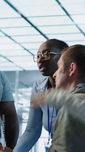 Employees fighting in office after mistake leading to errors in high tech AI data center. IT workers arguing server farm workplace after damaging artificial intelligence supercomputers, camera A