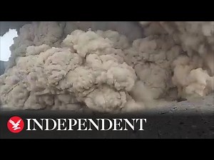 Smoke billows as volcano erupts in Chile