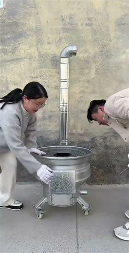 Wheel rim modified wood-fired stove wheelrimwoodfiredstove wheelrimwoodstove automobile diy foryou