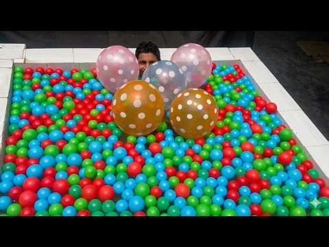 Balloon Fun Challenge in Pool Filled with 1500 Colourful Balls