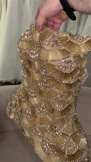 To order this gold dress DM reineecouture A statement gold corset dress featuring a structured