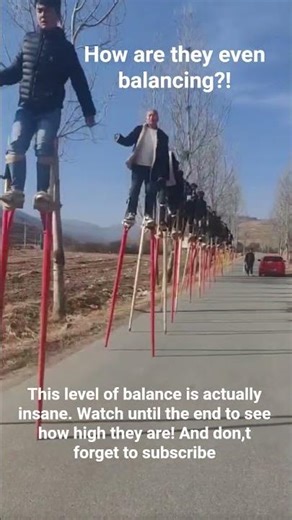 The rhythm of these stilts so satisfying #stiltwalking #balance #skills #viral #trending #amazing