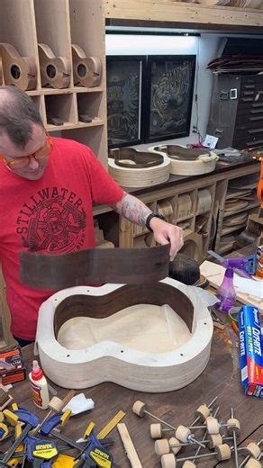 Todd Lunneborg on Instagram: "Installing neck and tail blocks for my next Model C. It’s a streaky set of Madagascar Rosewood with Orange highlights and, frankly, the grottiest set of Western Red Cedar I have. Zaney/ ugly streaks galore! These little model C’s are the coolest couch buddy guitars. They can be fancy or simple. In this case, it’s going to be special. Availability, aesthetics and sustainability are not matching up in these modern guitar building times. The luxury of having all three 
