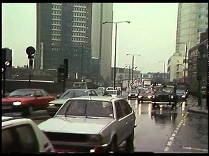 MOON over RIVER THAMES 1982\n\nSTOCK ROLL 12, items 1 & 2\n\nnight shot over Thames pier, and moon thro
