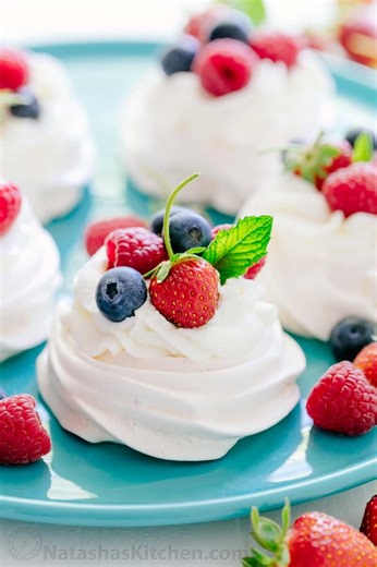 My Pavlova dessert recipe is an airy, cloud-like meringue that looks simply stunning for Easter and literally melts in your mouth. (Recipe in comments) | NatashasKitchen.com