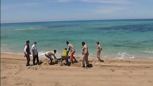 Boat carrying migrants sinks off Libya