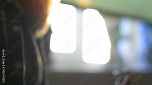 Slow motion. Close-up of guitar playing. Guitarist hits the strings of the guitar. Skill. Playing a musical instrument. Stringed Musical Instruments. Black guitar with abrasions. Ukulele Guitar