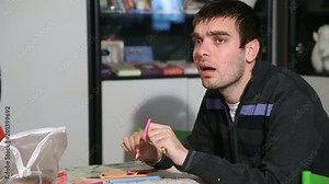 YOUNG MAN WITH AUTISM DRAWING