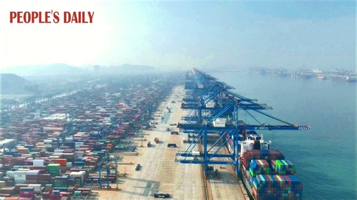 China's first self-built fully-automated terminal started operation Wednesday in east China's Qingdao Port. With nearly 200 remotely-operable loading machines, the terminal has two 100,000-metric-ton container berths and can save 80% of on-site manpower compared to a traditional one. | People's Daily, China