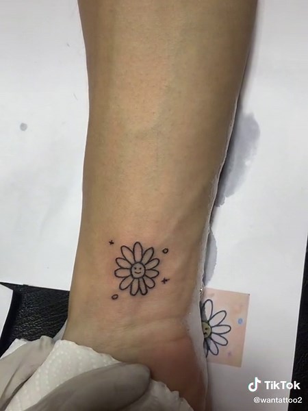 Fresh Daisy Tattoo Close-Up on Forearm