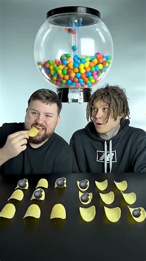 a giant gumball machine appears dropping gumballs on the table views!!